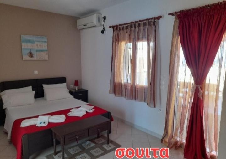 Delfini Aparthotel Akhladheri ภายนอก รูปภาพ